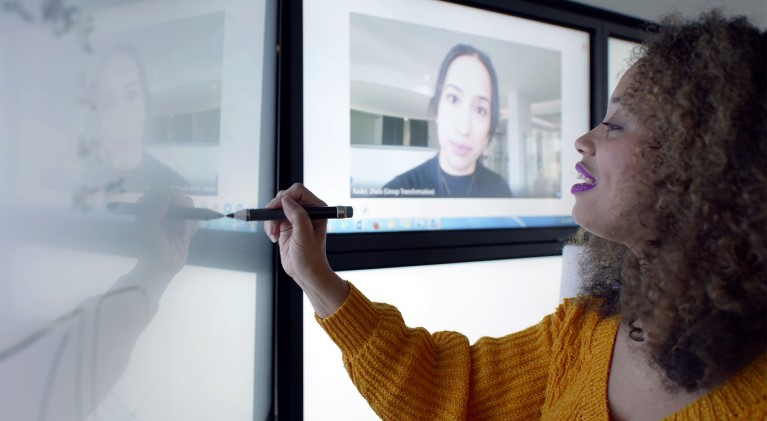 Women planning on a whiteboard