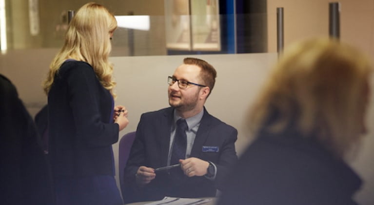 Helping customers in branch