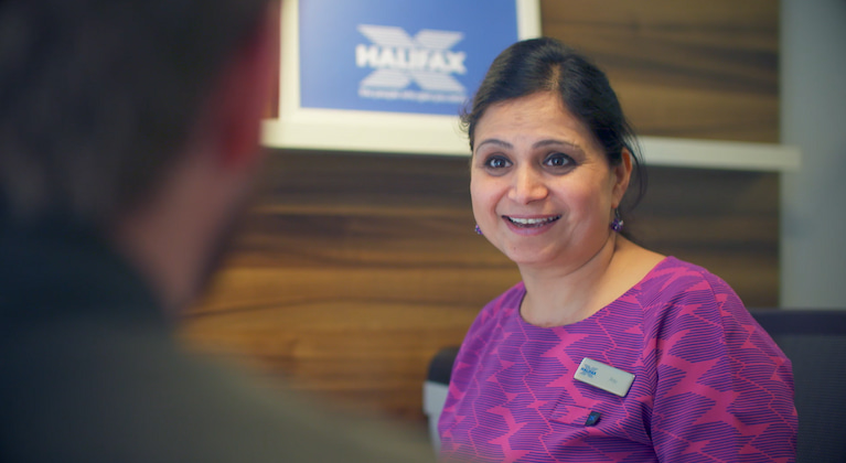 Halifax colleague helping a customer