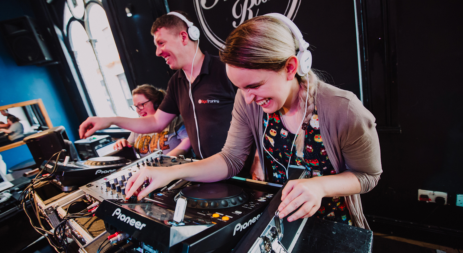 People DJ-ing at a party