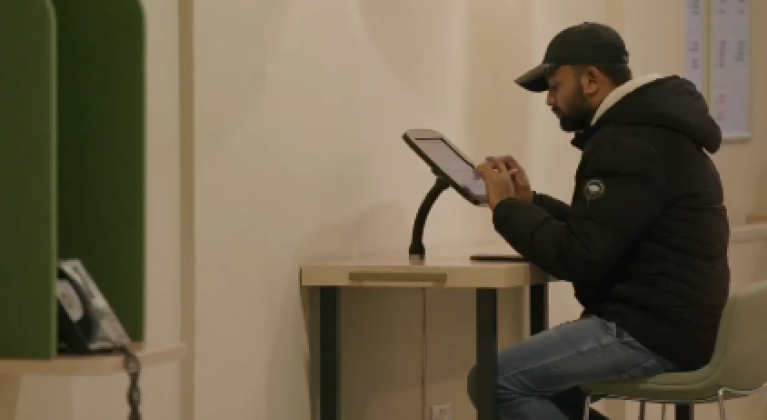 Homeless man opening a bank account