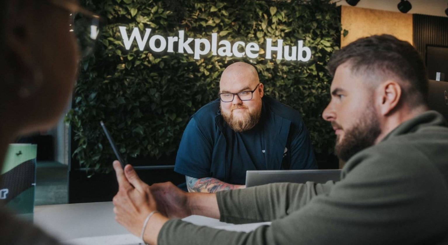 Colleagues in the workpace hub