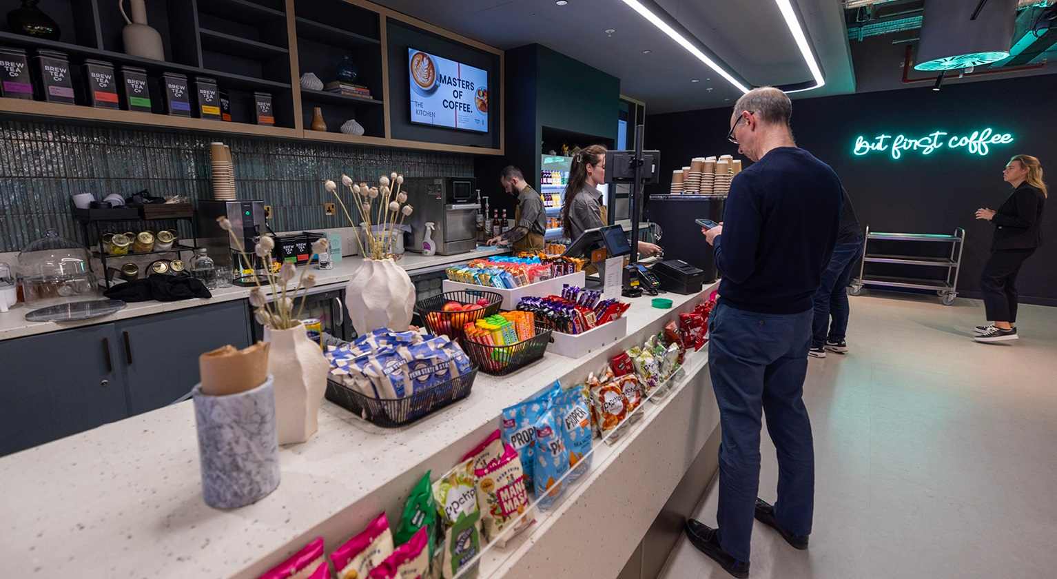 Image showing a kitchen station and people serving food
