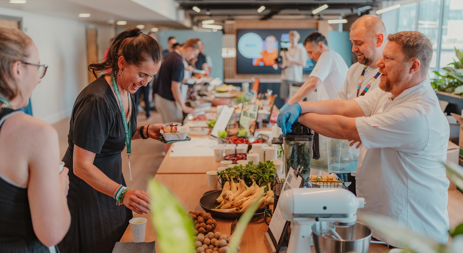 Image showing a kitchen station and people serving food