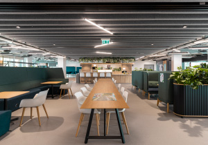 Image of a variety of workspaces including sofa areas, tables and chairs