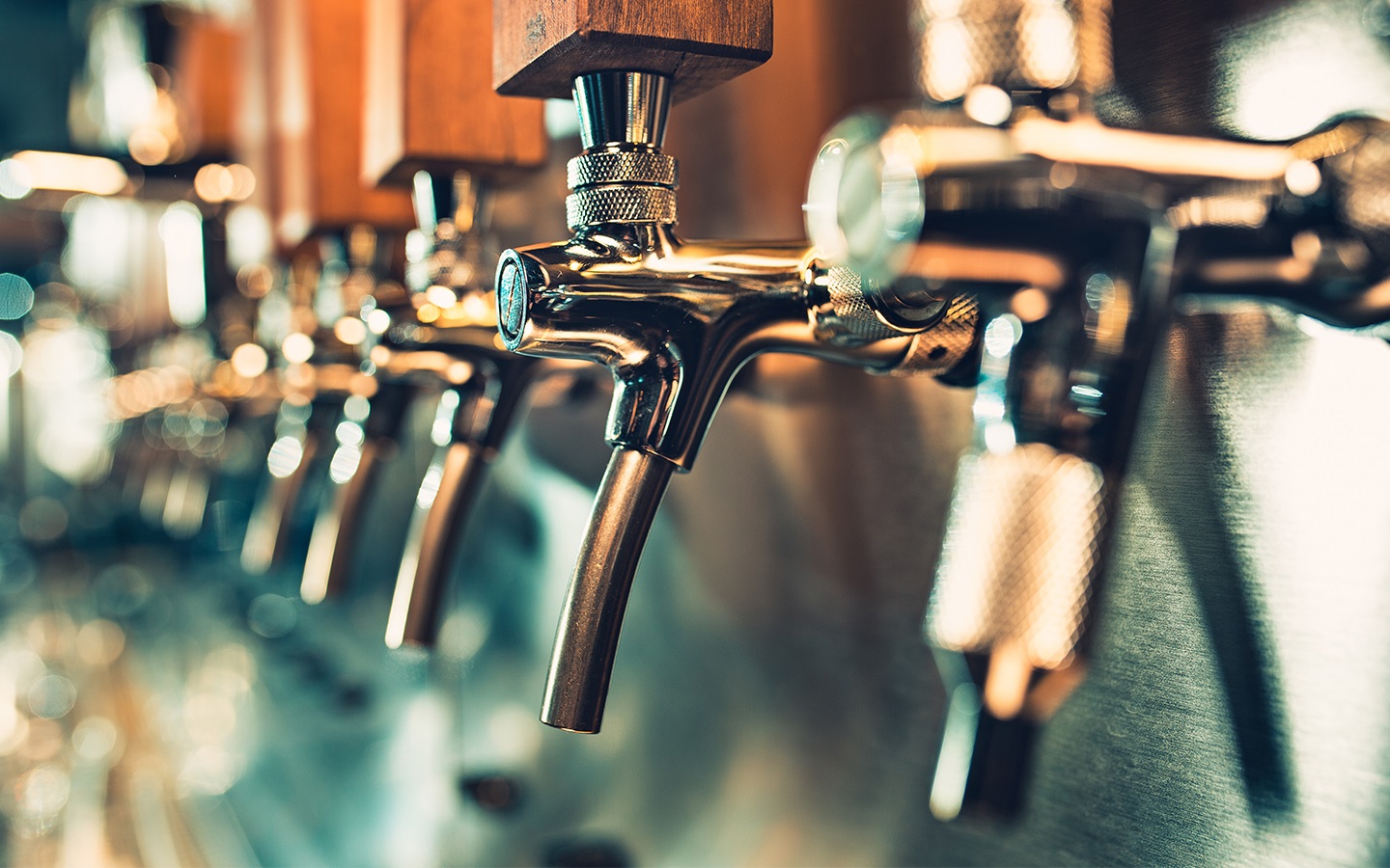 Close up of drinks taps in a pub