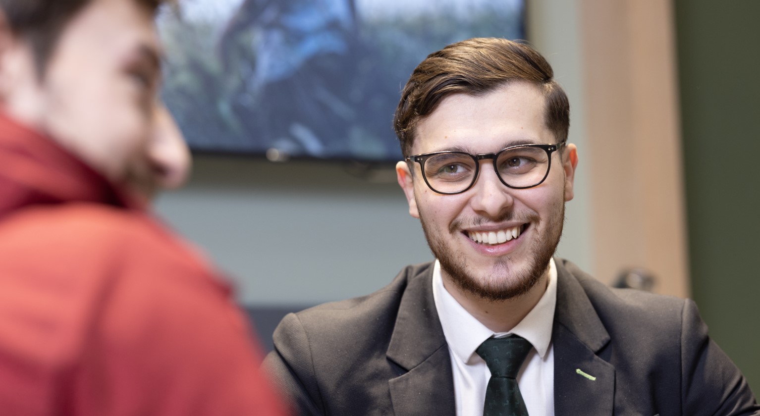 Lloyds Bank colleague helping a customer