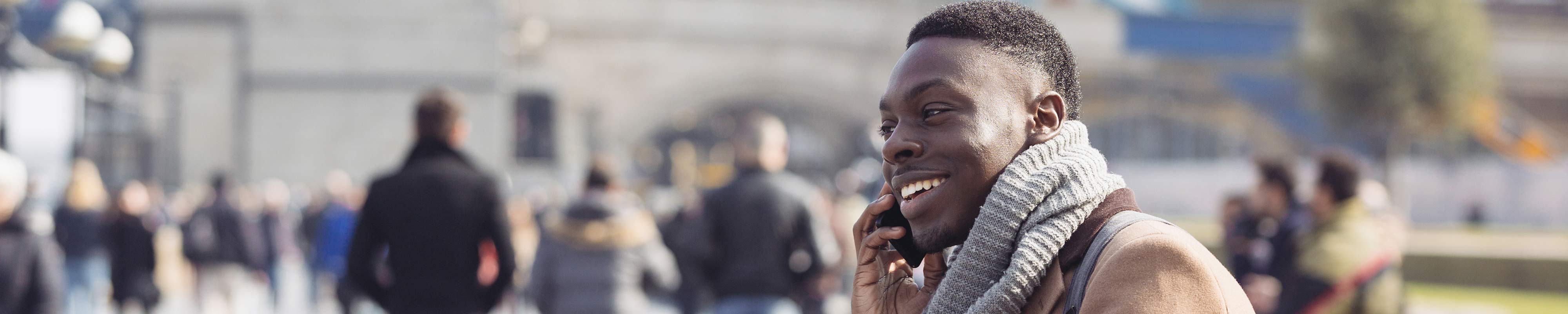 Man talking on mobile phone in the street 