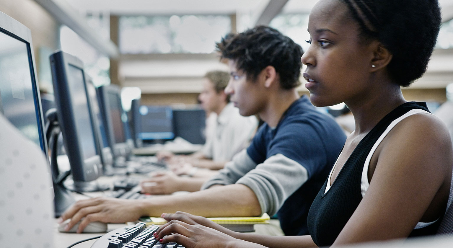 Woman sat at computer screen