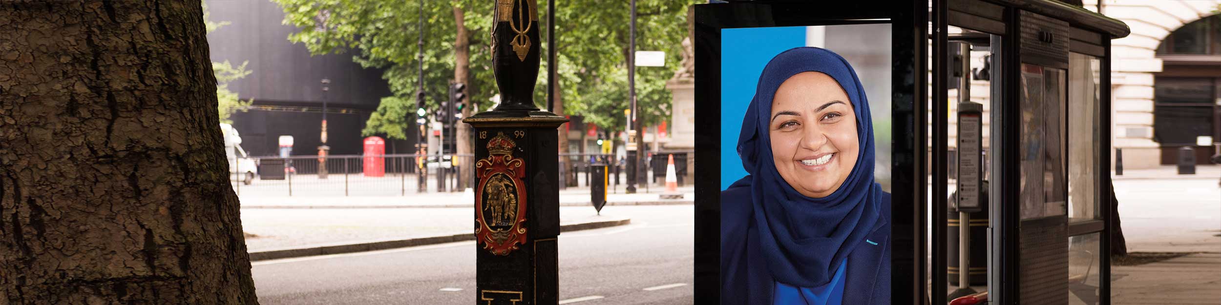 England street with a bus shelter ad