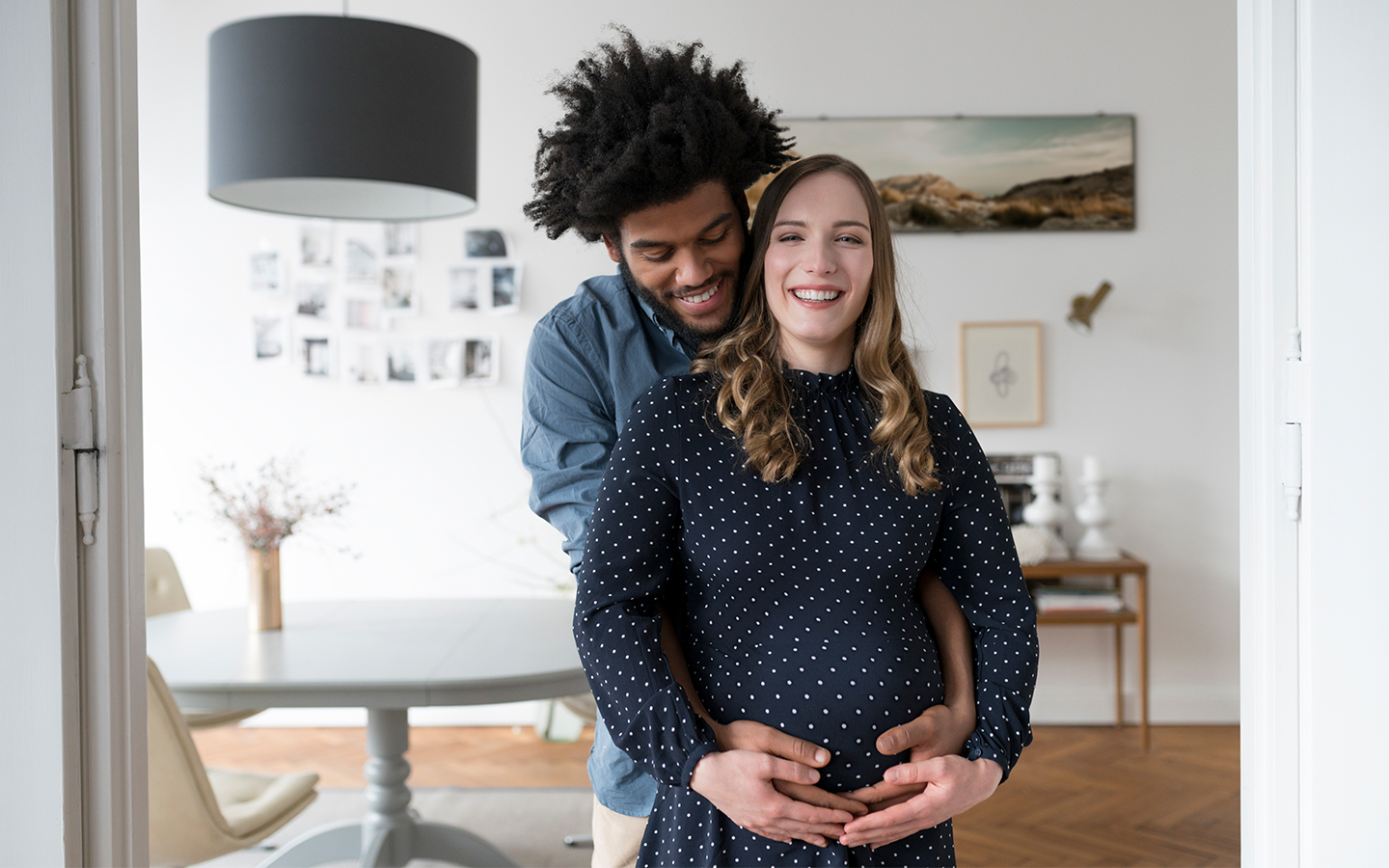 Mixed race expectant couple