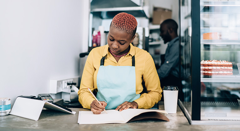 Woman business owner checking finances