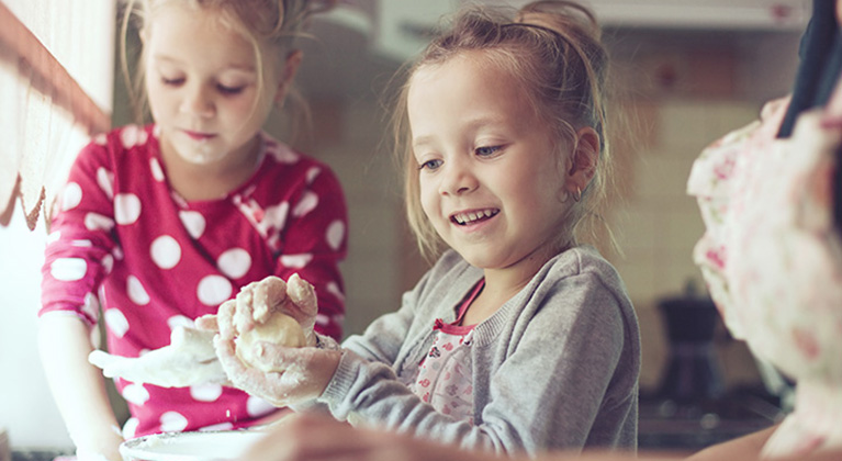 Children baking cakes